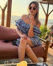 Desirable Nikki Tamboli in a Blue and White Off Shoulder Crop Top with a Layered Mini Skirt Pictures 01