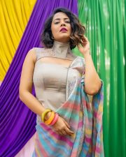 Ding Dong Actress Anasuya Bharadwaj in a Rainbow Striped Saree with a High Halter Neck Blouse Photos 03