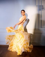 Elegant Amyra Dastur in an Orange and Ivory Lehenga with Marble Dye Effect Photos 01