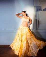 Elegant Amyra Dastur in an Orange and Ivory Lehenga with Marble Dye Effect Photos 04