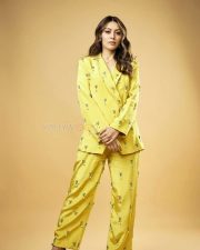 Elegant Hansika Motwani in a Yellow Double Breasted Oversized Pantsuit Photos 01