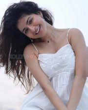 Enchanting Actress Iswarya Menon in a White Embroidered Spaghetti Strap Sundress Photos 03