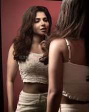 Enchanting Actress Iswarya Menon in a cream lace crop top and cream skirt photos 01