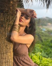 Enchanting Actress Mouni Roy in a Brown Strapless Mini Dress Photos 03