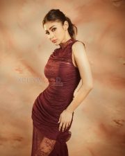 Enchanting Actress Mouni Roy in a Burgundy Ruched Lace Bodycon Dress Photos 02