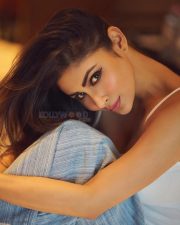 Glam Mouni Roy in a White Tank Top and Blue Denim Photos 02