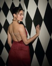 Glamorous Amyra Dastur in a Red Backless Gown Photos 02