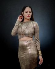 Glamorous Anasuya Bharadwaj in a Golden Dress Photos 02