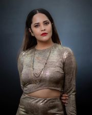 Glamorous Anasuya Bharadwaj in a Golden Dress Photos 03