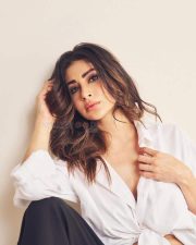 Grace and Glamour Mouni Roy in a Classic Tied Up White Shirt and Black Pants Photos 03