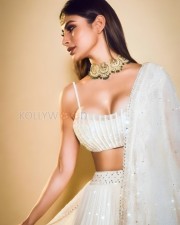 Graceful Mouni Roy in a White Lehenga Photos 01