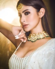 Graceful Mouni Roy in a White Lehenga Photos 03