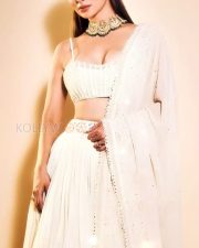 Graceful Mouni Roy in a White Lehenga Photos 04