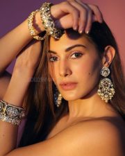 Influencer Life Actress Amyra Dastur in a Light Green Floral Embroidered Lehenga Photos 02