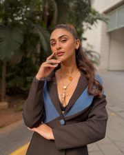 Jaageer Actress Krystle DSouza in a Black and Blue Single Breasted Blazer with Matching Flared Pants Photos 04