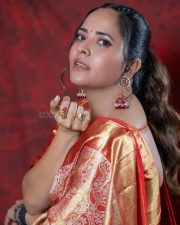 Kollagottinadhiro Actress Anasuya Bharadwaj in a Traditional Red and Gold Kanchipuram Silk Saree with a Matching Red Silk Blouse Pictures 02
