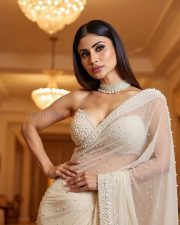Luminous Actress Mouni Roy in a White Pearl Embellished Saree Photos 02