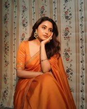Made in Korea Actress Priyanka Mohan in an Orange Saree with Embroidered Details Photos 02