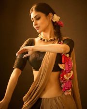 Mesmerizing Actress Mouni Roy in a Gold Chain Embellished Gown Photos 05