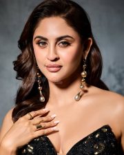 Midnight Glam Krystle Dsouza in a Black and Gold Strapless Gown with a Plunging Cleavage Neckline Photos 01