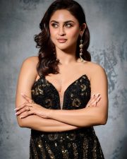 Midnight Glam Krystle Dsouza in a Black and Gold Strapless Gown with a Plunging Cleavage Neckline Photos 03