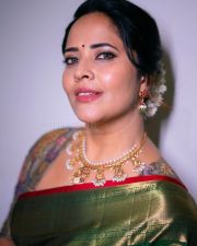 Pina Pataram Actress Anasuya Bharadwaj in a Green Silk Saree with a Multi Colored Floral Designer Blouse Pictures 02