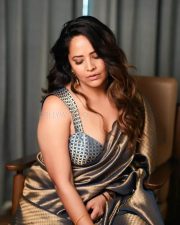 Prema Vimanam Actress Anasuya Bharadwaj in a Blue and Gold Saree with a Matching Embroidered Blouse Photos 02