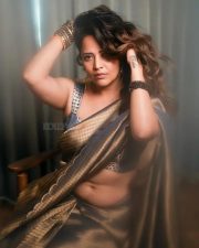 Prema Vimanam Actress Anasuya Bharadwaj in a Blue and Gold Saree with a Matching Embroidered Blouse Photos 03
