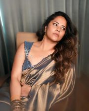 Prema Vimanam Actress Anasuya Bharadwaj in a Blue and Gold Saree with a Matching Embroidered Blouse Photos 04