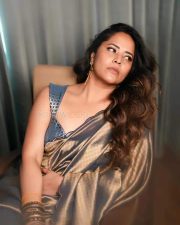Prema Vimanam Actress Anasuya Bharadwaj in a Blue and Gold Saree with a Matching Embroidered Blouse Photos 04