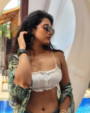 Provocative Shilpa Manjunath in a White Strappy Bikini Crop Top with Mini Denim Shorts Photos 04