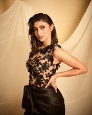 Ravishing Mouni Roy in a Black Thigh Slit Gown with a Netted Black Shirt Photos 02
