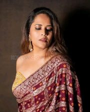 Royal Glamour Anasuya Bharadwaj in a Maroon Benaras Saree with a Strapless Yellow Bralette Photos 03