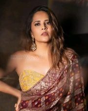 Royal Glamour Anasuya Bharadwaj in a Maroon Benaras Saree with a Strapless Yellow Bralette Photos 04