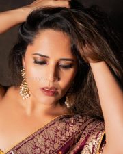 Royal Glamour Anasuya Bharadwaj in a Maroon Benaras Saree with a Strapless Yellow Bralette Pictures 02