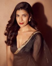 Section 84 Actress Nimrat Kaur in a Sheer Black Saree with a Matching Deep Neck Blouse Pictures 03