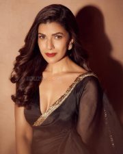 Section 84 Actress Nimrat Kaur in a Sheer Black Saree with a Matching Deep Neck Blouse Pictures 03