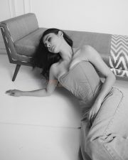 Sensual Actress Mouni Roy in a Strapless Corset Top and Jeans Photos 03