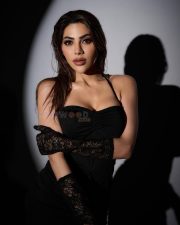Sensuous Nikki Tamboli in a Bold Black Dress Photos 02