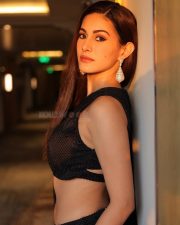 Sexy Amyra Dastur in a BLack Cut Out Micro Blouse with High Waisted Black Skirt Photos 04