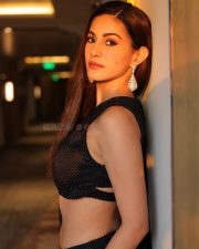 Sexy Amyra Dastur in a BLack Cut Out Micro Blouse with High Waisted Black Skirt Photos 04