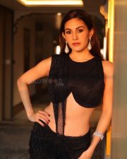 Sexy Amyra Dastur in a BLack Cut Out Micro Blouse with High Waisted Black Skirt Photos 06