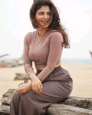 Sexy Iswarya Menon in a Brown Long Sleeve Crop Top with Matching Wide Leg Baggy Pants Photos 02
