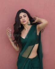 Sexy Mouni Roy in a Plain Green Saree with a Green Strappy Blouse Photos 02