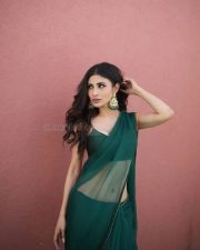 Sexy Mouni Roy in a Plain Green Saree with a Green Strappy Blouse Photos 03