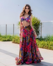 Sizzling Nikki Tamboli in a Multi Colored Draped Skirt Set Photos 01