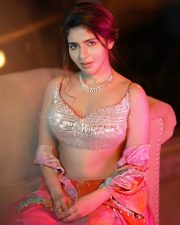 South Beauty Iswarya Menon Navel in a Sequin Bralette with a Red Skirt Photos 02