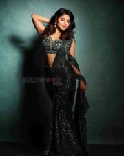 Stunning Iswarya Menon in a Green Sequined Saree Pictures 01