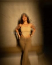 Stunning Mallu Beauty Iswarya Menon in a Beige Ribbed Knit Crop Top and Olive Green Jeans Photos 02