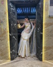 Stunning Mouni Roy in a White and Gold Lehenga Photos 03 Stunning Mouni Roy in a White and Gold Lehenga Photos 03